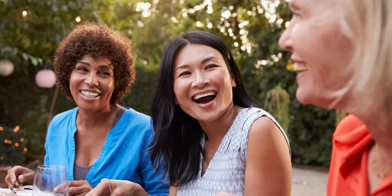 Three women eating lunch al fresco