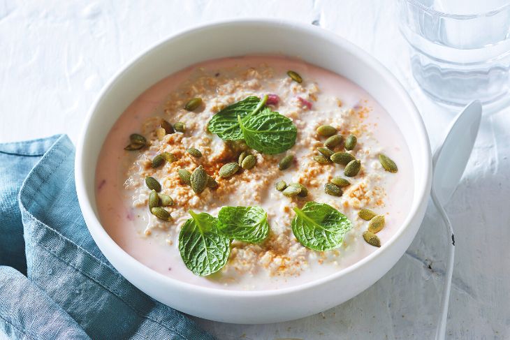 A bowl of high protein bircher muesli.