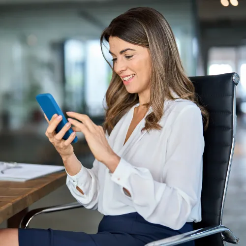 Business woman on her mobile